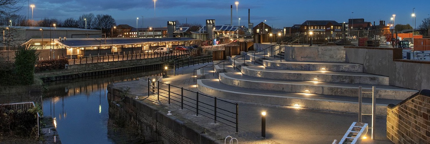 Canal with concrete steps going down to it